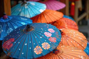 summer accessories sun umbrellas on sky background. photo