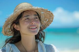portrait of happy Japanese woman relaxing on Okinawa beach. photo