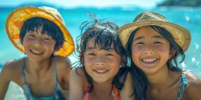 portrait of happy Japanese teens relaxing on Okinawa beach. photo