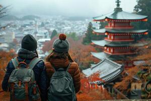 couple traveling in Japan, visiting temple. photo
