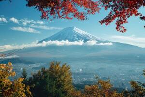 Fuji Mountain and Maple Leaves with Morning Mist in Autumn, Japan. photo