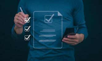Businessmen mark check blocks to verify the correctness and approve or accept the agreement. in digital documents Concept of working via the internet photo