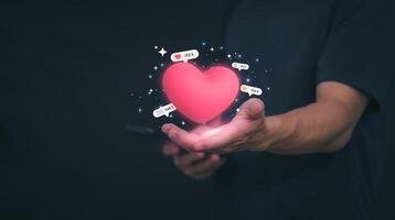 The concept of using digital media, technology, and social media. Surfing online, male hand using smartphone To play or use social media, remote work concept, work from home via the Internet photo