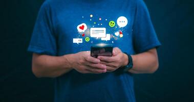 The concept of using digital media, technology, and social media. Surfing online, male hand using smartphone To play or use social media, remote work concept, work from home via the Internet photo