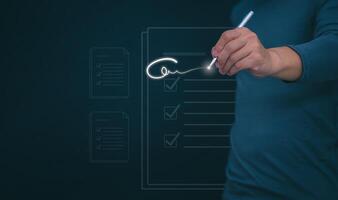 The person signing an electronic document on a smartphone, management concept, digital transformation Internet of Things, Big Data and Business Processes, Automated Operations, Data Storage photo