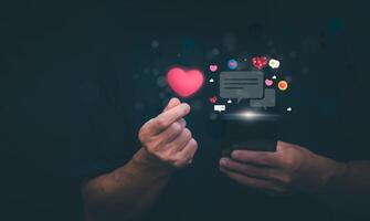 The concept of using digital media, technology, and social media. Surfing online, male hand using smartphone To play or use social media, remote work concept, work from home via the Internet photo
