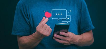 The concept of using digital media, technology, and social media. Surfing online, male hand using smartphone To play or use social media, remote work concept, work from home via the Internet photo