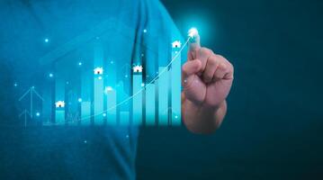 Planning and strategy, stock market, business growth, progress or success concept, businessman or trader showing real estate stock Virtual holograms, invest in stock market trading or digital assets. photo
