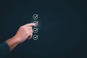 Businessmen mark check blocks to verify the correctness and approve or accept the agreement. in digital documents Concept of working via the internet photo