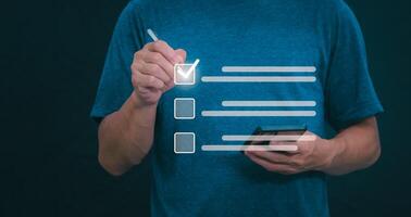 Businessmen mark check blocks to verify the correctness and approve or accept the agreement. in digital documents Concept of working via the internet photo
