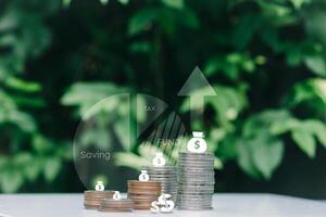 financial research government taxes and tax return calculation concepts Businessmen showing taxes on real estate Ideas for filling out online tax return forms for payments online photo