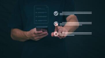 Businessmen mark check blocks to verify the correctness and approve or accept the agreement. in digital documents Concept of working via the internet photo