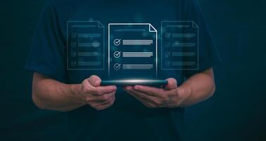Businessmen mark check blocks to verify the correctness and approve or accept the agreement. in digital documents Concept of working via the internet photo