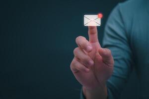 businessmen use their mobile phones to check newsletters or emails each day. For communication or receiving various news In the internet age, the concept of working anywhere photo