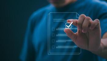 Businessmen mark check blocks to verify the correctness and approve or accept the agreement. in digital documents Concept of working via the internet photo