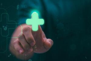 Businessman showing a symbol or icon related to health insurance or healthcare. Concepts for developing and accessing care anywhere, anytime, doing business related to the hospital business photo
