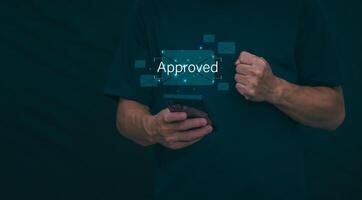 Male hand pointing at symbol of guarantee of quality of service Certification concept and standard quality control Standard warranty Documents certified on virtual screen photo