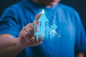 Businessman showing continuous growth of finances With internet technology keeping global data connections with internet technology, big data, information search, and online marketing. photo