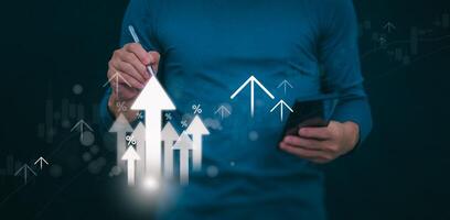Planning and strategy, stock market, business growth, progress or success concept, businessman or trader showing growing virtual holographic stocks, invest in stock market trading or digital assets photo