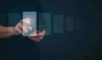 The man using smartphones, watching videos and studying online courses With the internet, the concept of global data connection with technology internet, big data, information search, online marketing photo