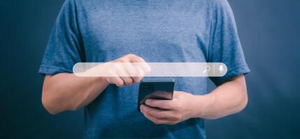 Information search technology, search engine optimization, male hand using a smartphone to search information, using the search bar function on your website photo