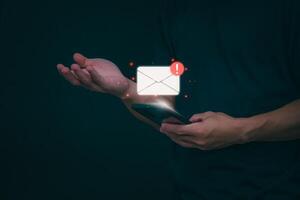 businessmen use their mobile phones to check newsletters or emails each day. For communication or receiving various news In the internet age, the concept of working anywhere photo