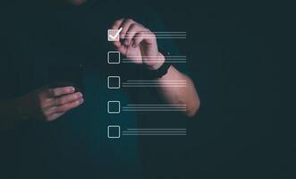 Businessmen mark check blocks to verify the correctness and approve or accept the agreement. in digital documents Concept of working via the internet photo