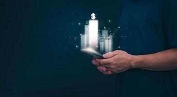 Planning and strategy, stock market, business growth, progress or success concept, businessman or trader showing growing virtual holographic stocks, invest in stock market trading or digital assets photo
