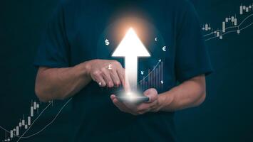 Planning and strategy, stock market, business growth, progress or success concept, businessman or trader showing growing virtual holographic stocks, invest in stock market trading or digital assets photo