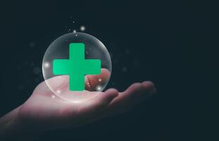 Businessman showing a symbol or icon related to health insurance or healthcare. Concepts for developing and accessing care anywhere, anytime, doing business related to the hospital business photo