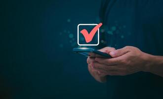 Businessmen mark check blocks to verify the correctness and approve or accept the agreement. in digital documents Concept of working via the internet photo