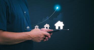 Planning and strategy, stock market, business growth, progress or success concept, businessman or trader showing real estate stock Virtual holograms, invest in stock market trading or digital assets. photo