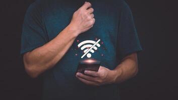 The smartphone's system displays a symbol on the screen to show the wifi disconnect status that there is a problem with the user. managing digital transformation Internet of Things Automation photo