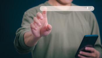 Information search technology, search engine optimization, male hand using a smartphone to search information, using the search bar function on your website photo