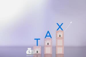 financial research government taxes and tax return calculation concepts Businessmen showing taxes on real estate Ideas for filling out online tax return forms for payments online photo