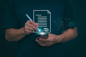The person signing an electronic document on a smartphone, management concept, digital transformation Internet of Things, Big Data and Business Processes, Automated Operations, Data Storage photo