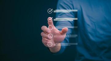 Businessmen mark check blocks to verify the correctness and approve or accept the agreement. in digital documents Concept of working via the internet photo