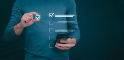 Businessmen mark check blocks to verify the correctness and approve or accept the agreement. in digital documents Concept of working via the internet photo