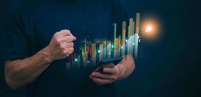 Planning and strategy, stock market, business growth, progress or success concept, businessman or trader showing growing virtual holographic stocks, invest in stock market trading or digital assets photo