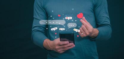 The concept of using digital media, technology, and social media. Surfing online, male hand using smartphone To play or use social media, remote work concept, work from home via the Internet photo