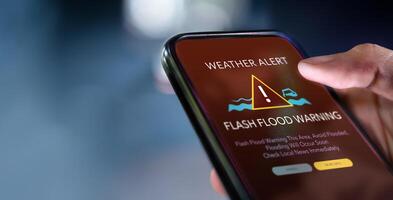 Resilience and Adaptability for Climate Change, Environment Issue, Flash Flood Warning System Alert on Mobile Phone photo