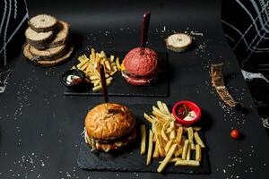 Black Table With Burger and Fries photo