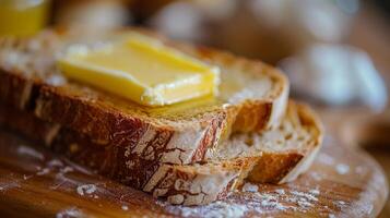 Bread with Butter, a slice of bread with a thick layer of creamy butter melting into it photo