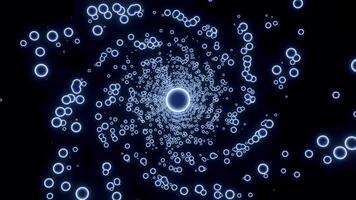 Colorful neon bubbles flying in a spiral on a black background, seamless loop. Design. Rotating tornado of small circles. video
