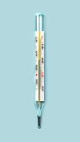 Mercury-in-glass thermometer with temperature mark 39 C on blue background flat lay vertical stopmotion animation slow motion video