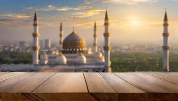 Ramadan promotion concept Empty wooden table with mosque background photo