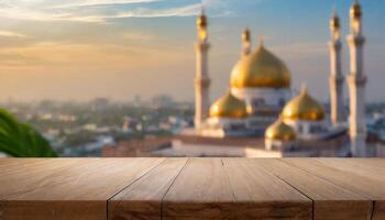Ramadan promotion concept Empty wooden table with mosque background photo