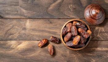 Ramadan promotion concept Dates are on a wooden table with copy space area photo