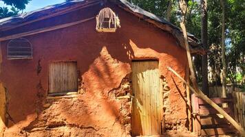 rustic house made of wood and clay photo