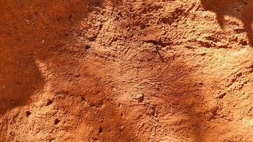 abstract background with rustic orange terracotta texture photo